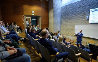 People attending the symposium